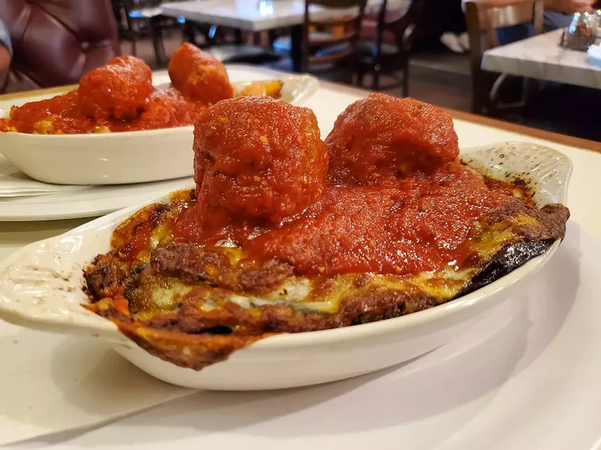 a dish covered in marinara
