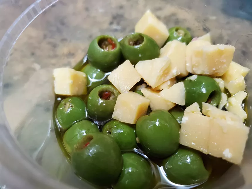 green olives and chunks of cheese