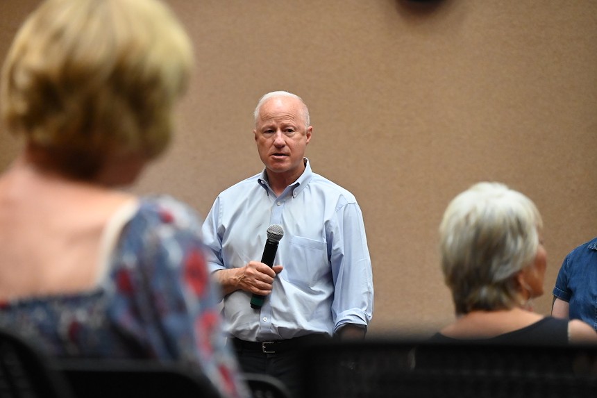 Mike Coffman speaks during a regular town hall.