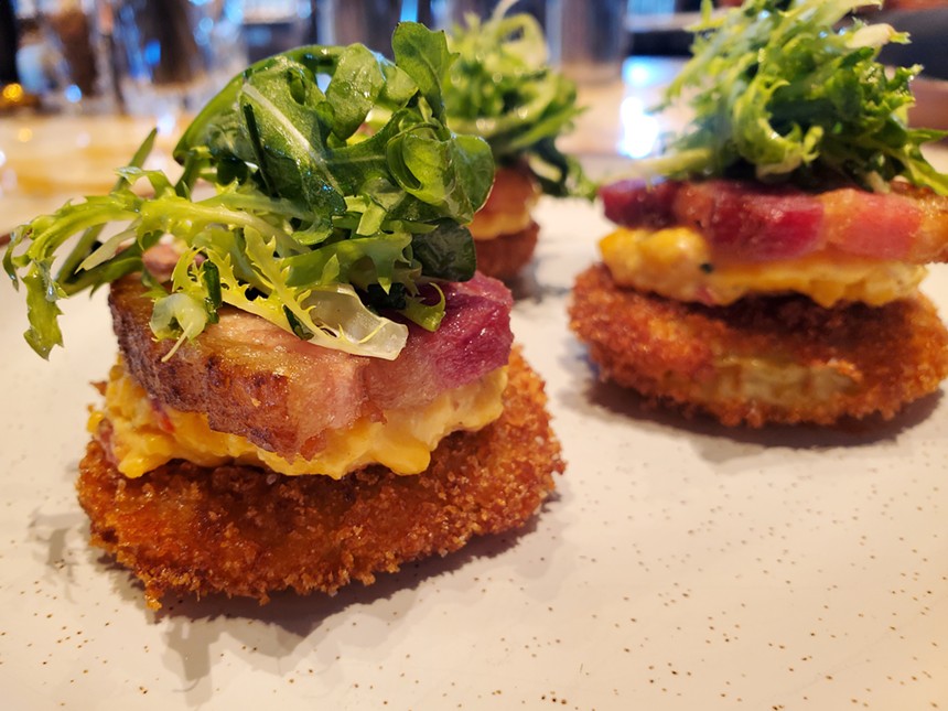 fried green tomato with pork belly on top