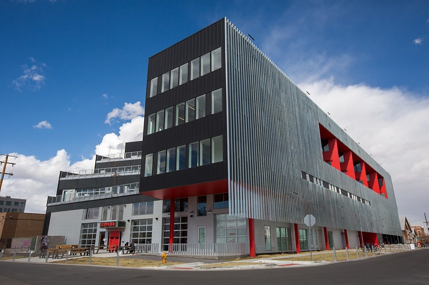 the outside of a multi-level black and red building