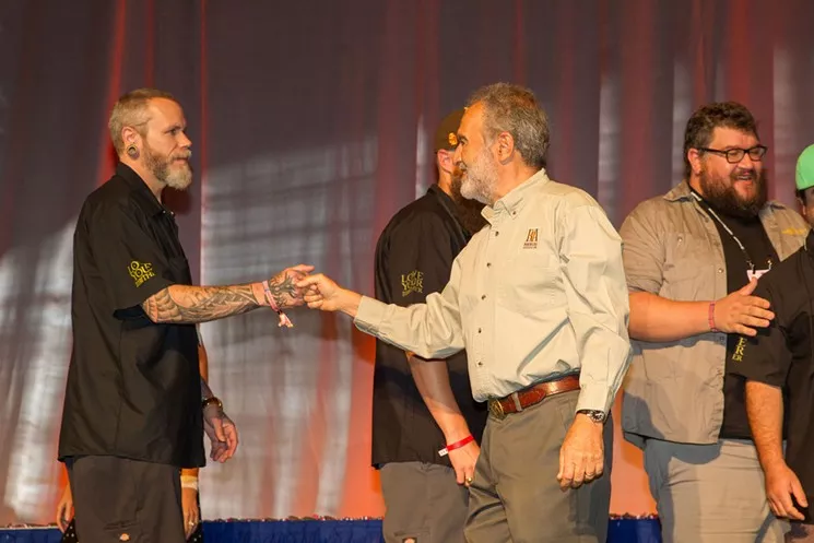 two men shaking hands