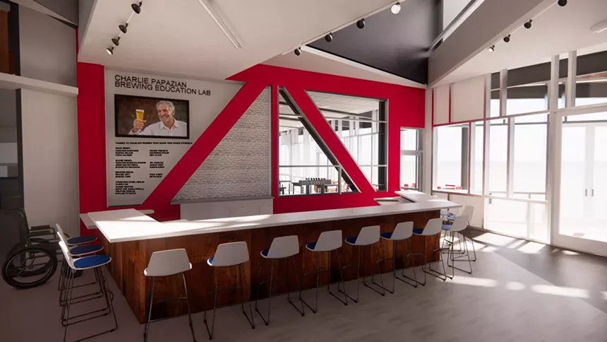 a rendering of a counter with chairs around it inside a building