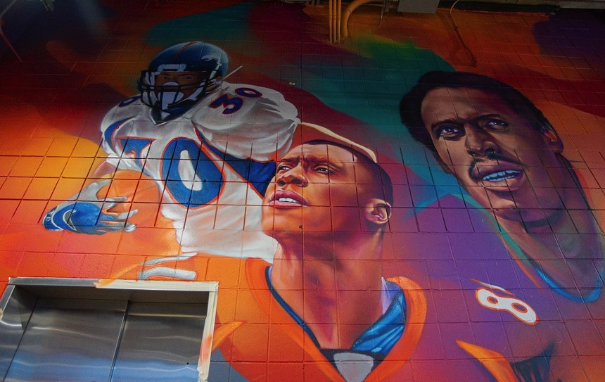 a mural of football players