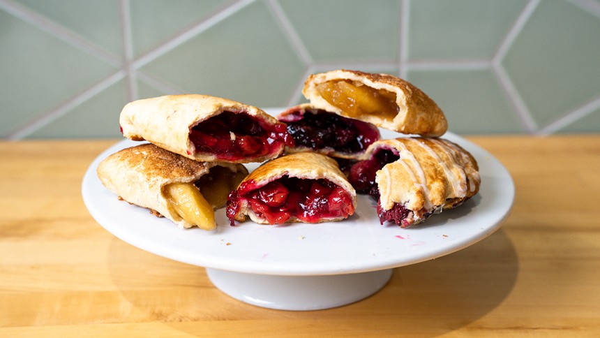 cherry hand pies on a plate
