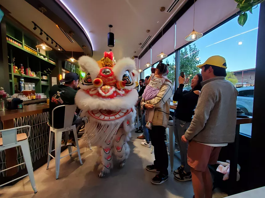 drangon dancing inside a restaurant