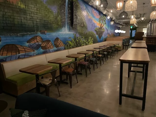 mural behind a banquet with tables