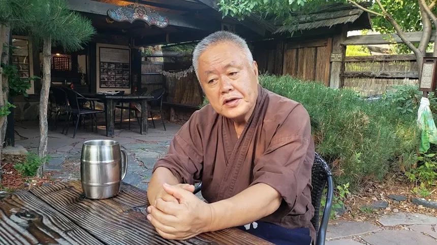 a man sitting at a table