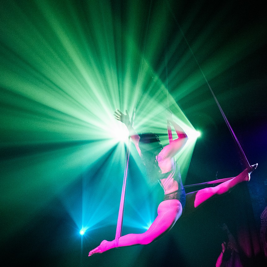 woman performing with aerial silks
