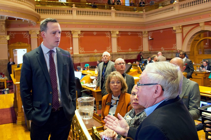 Senate President Steve Fenberg and Senator Bob Garnder argue on the Senate floor.