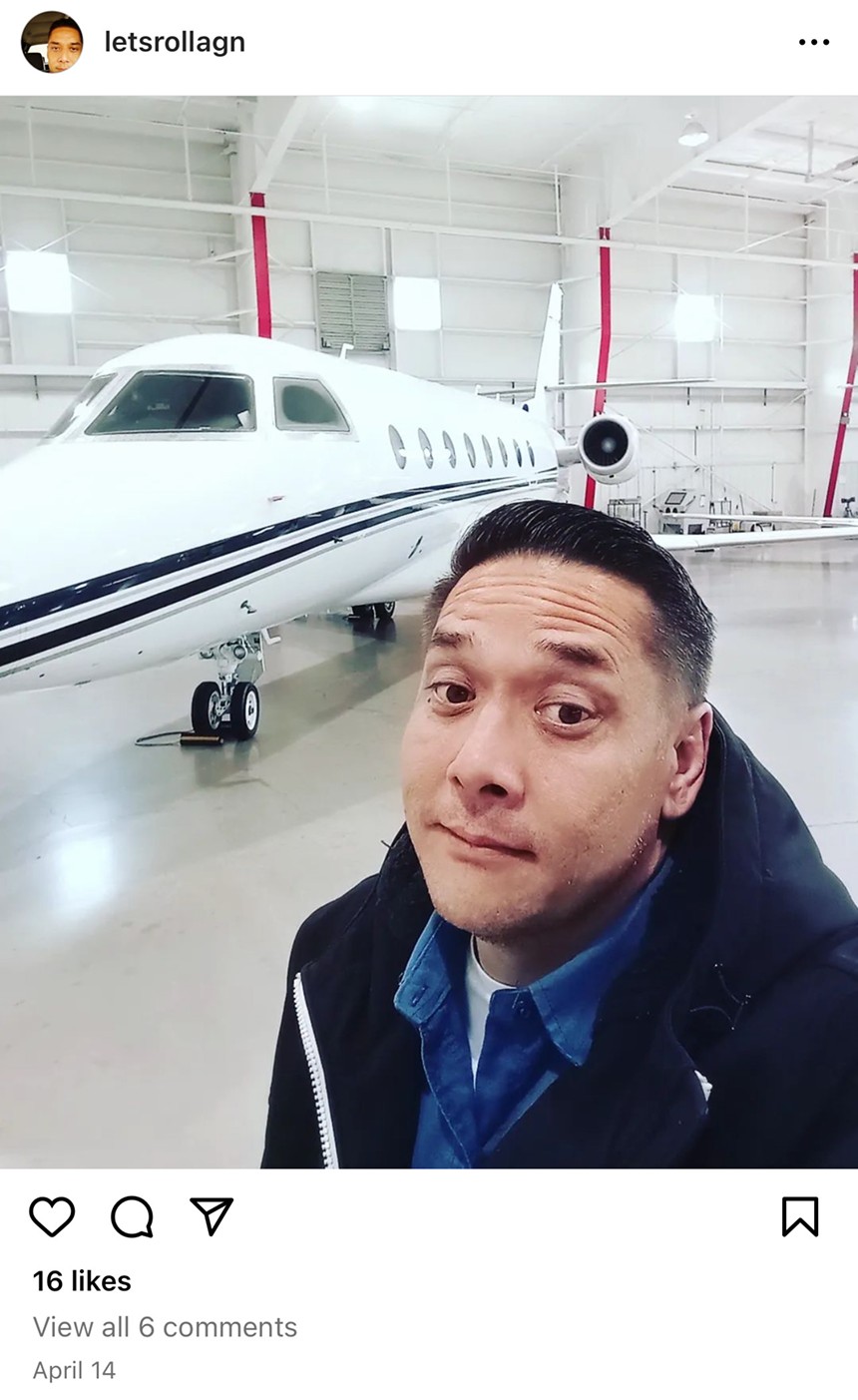 Patrick Apostol standing by a private jet in Denver, Colorado.