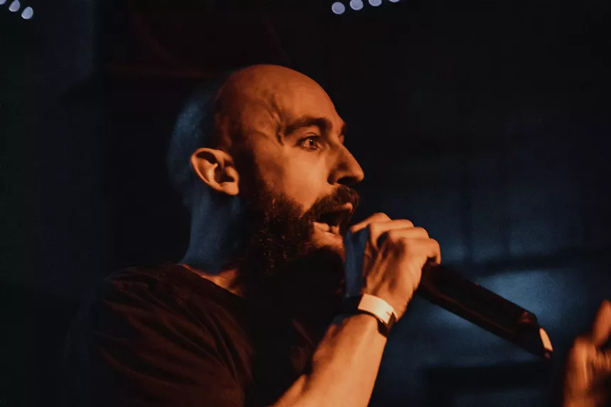 man speaking into microphone