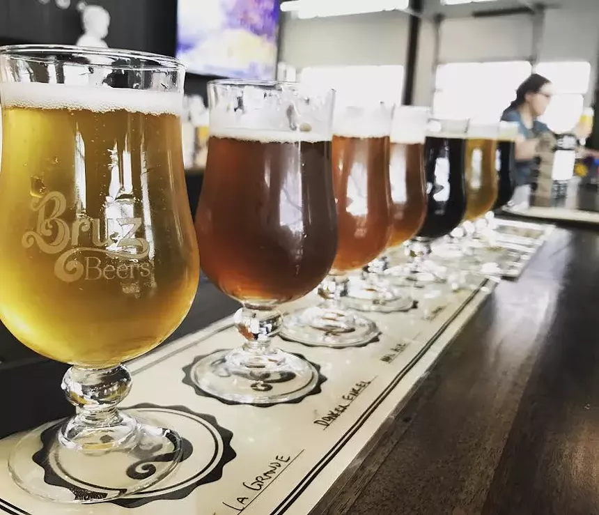 glasses of beer in a line