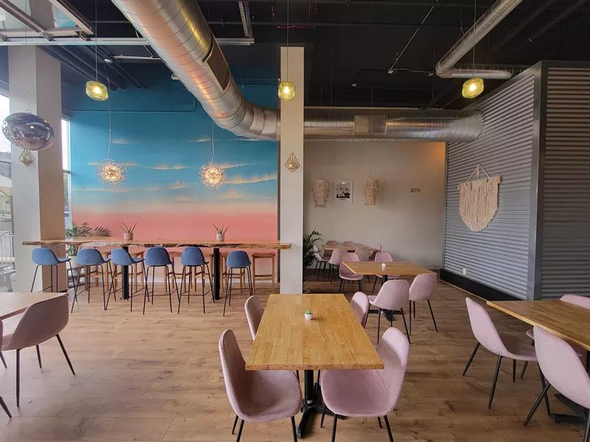 interior of a restaurant with pastel colors