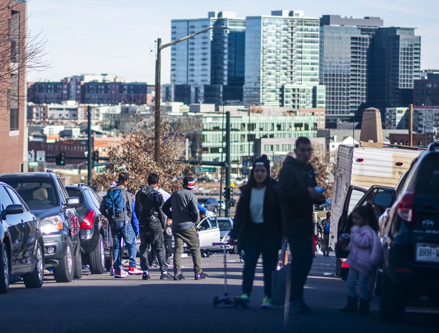 migrants on the edge of downtown Denver.