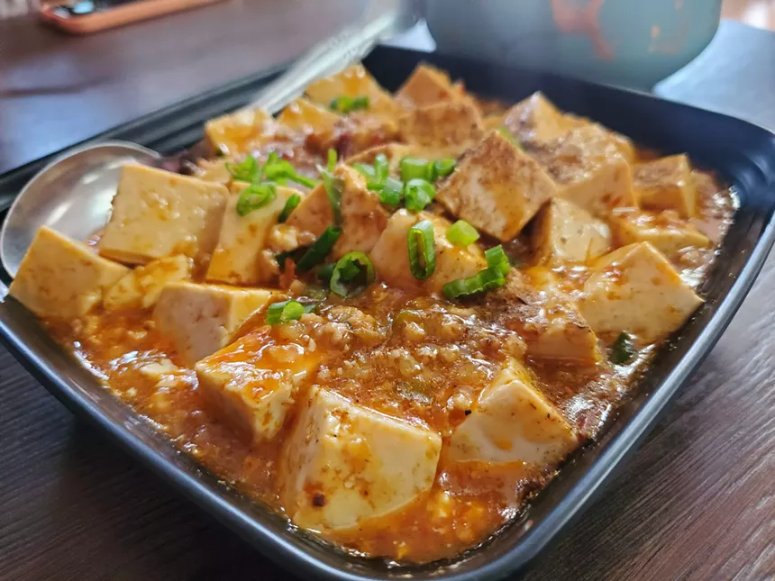 a bowl of tofu in sauce