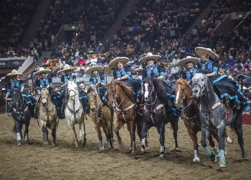 women riding sidesaddle at rodeo