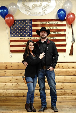 Jayson and Lauren Boebert posing for a photo.