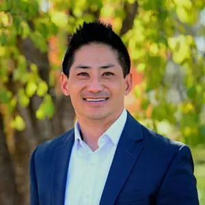 Peter Yu posing for a photo.