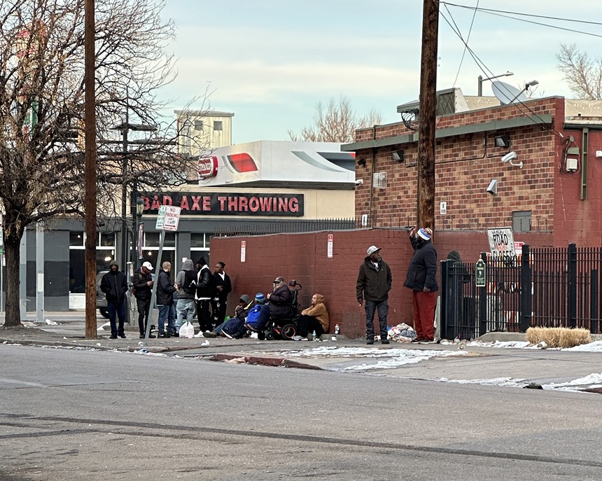People congregating on Ogden Street near Colfax Avenue and 7-Eleven.