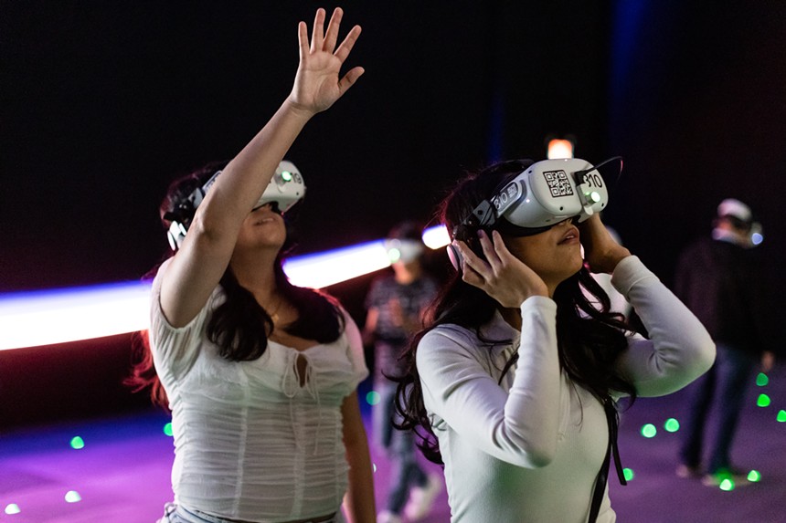 women with VR headset on