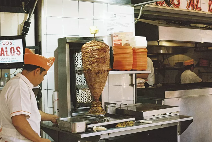 meat on a tromp at a taco stand