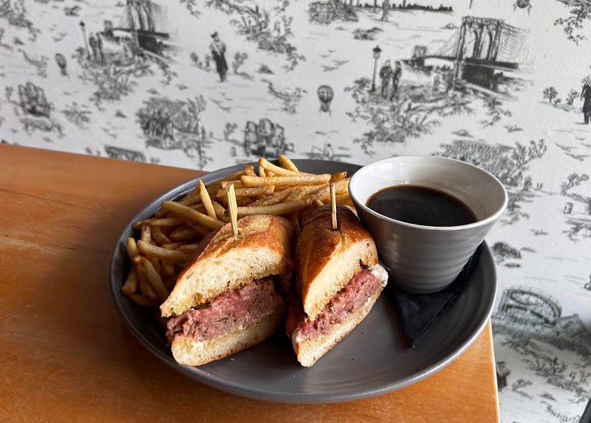 a french dip sandwich and fries
