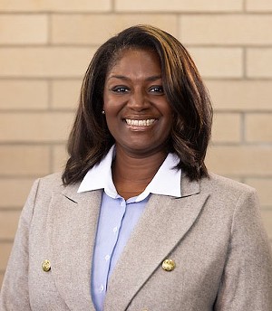 A woman poses for the camera.