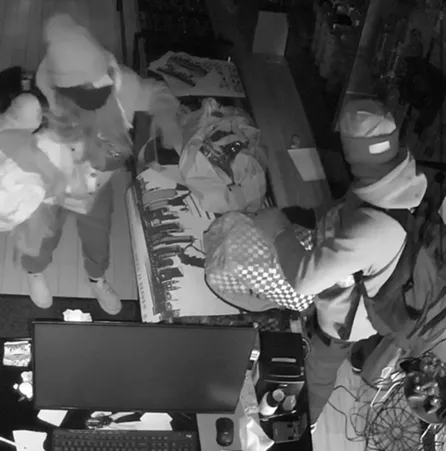 Surveillance footage showing thieves who broke into the Positive Vibes smoke shop in Denver.