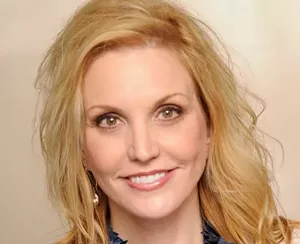 blonde woman smiling