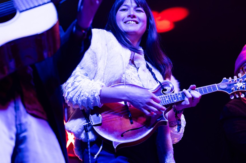 woman playing a mandolin