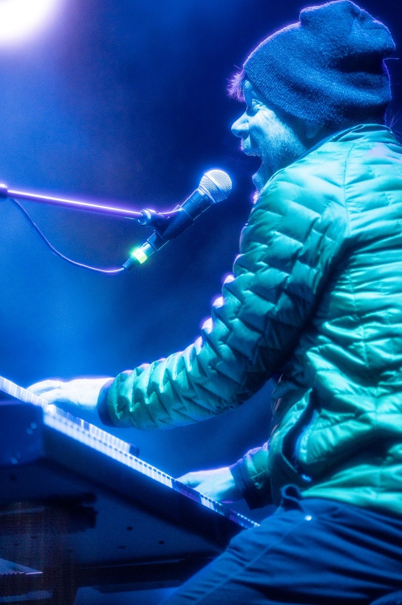 a man playing keyboard