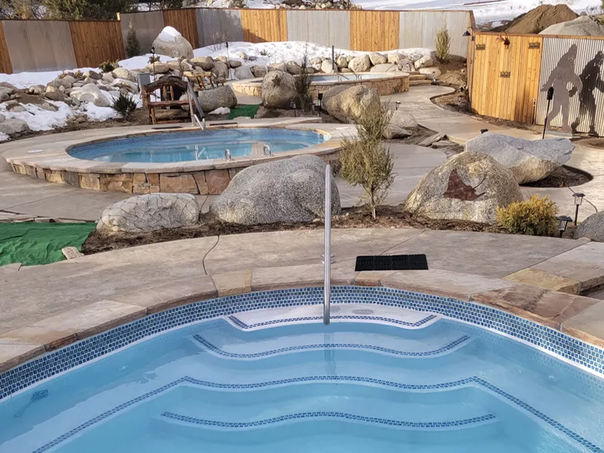 Clear, clean water inside tiled pools at Charlotte Hot Springs