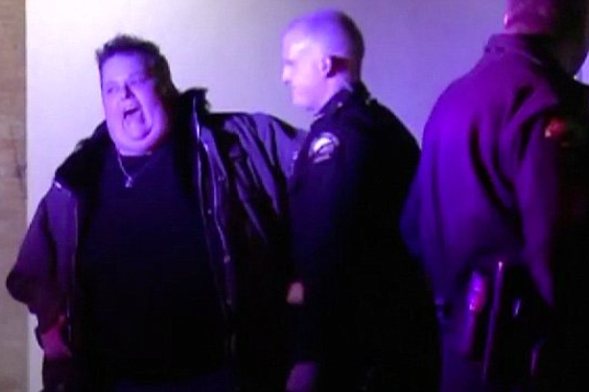 Ralphie May is escorted by Grand Junction Police.