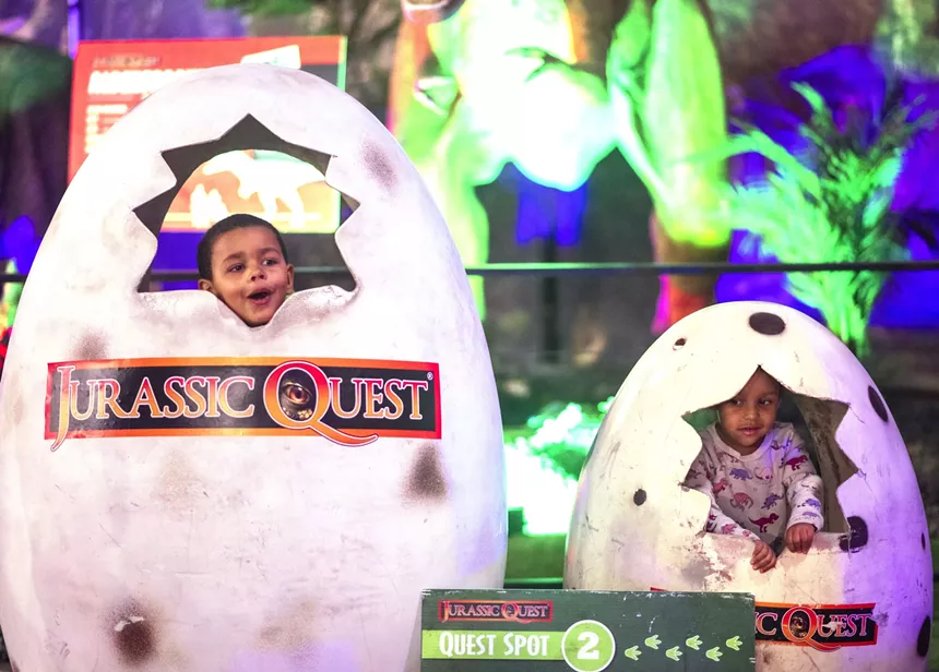 children by dinosaur eggs