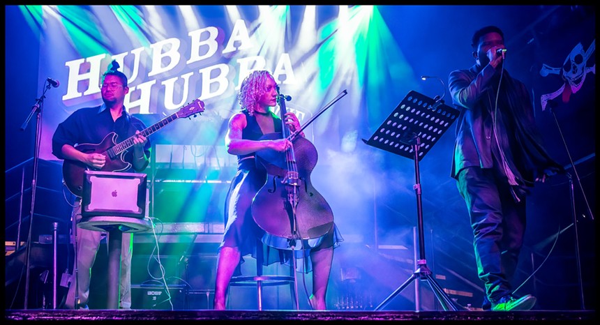 woman playing cello on stage