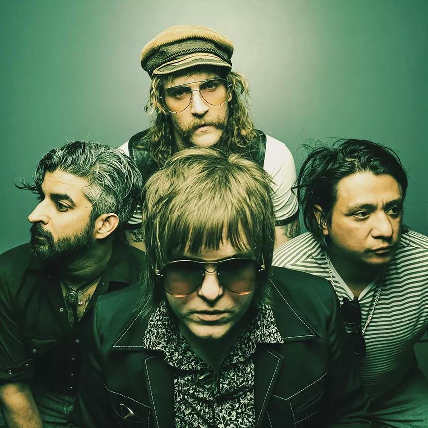 band poses for photo