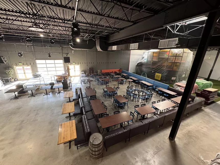a seating area inside a large room