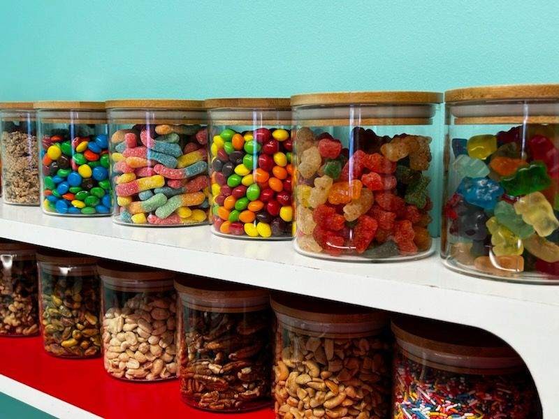 various candy and nuts in jars