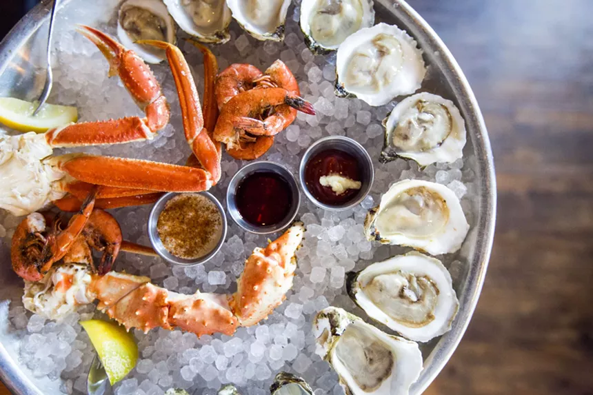oysters and crab legs on ice