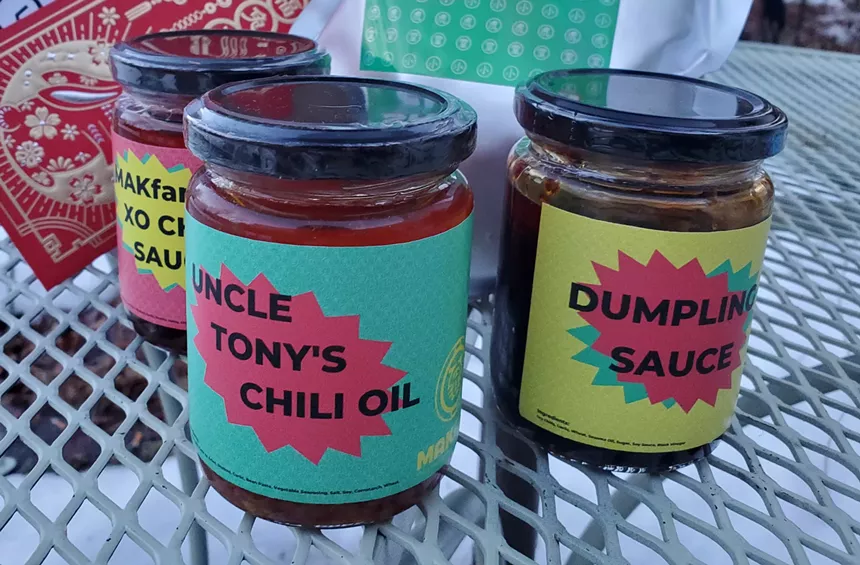 three jars with bright labels