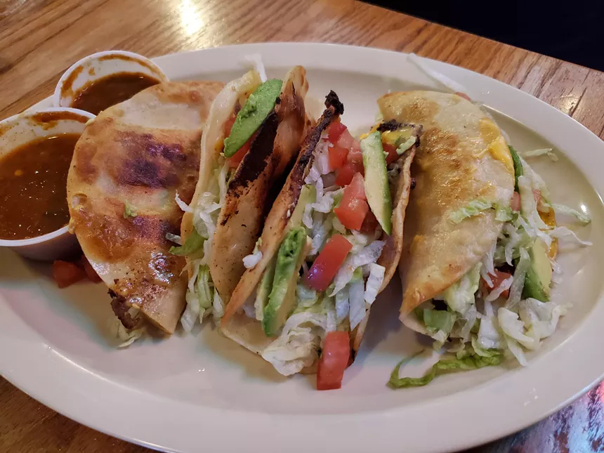 a plate of tacos