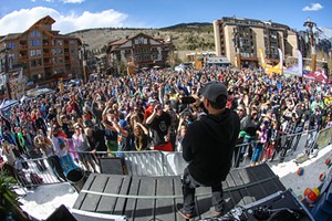 band in front of crowds at ski resort