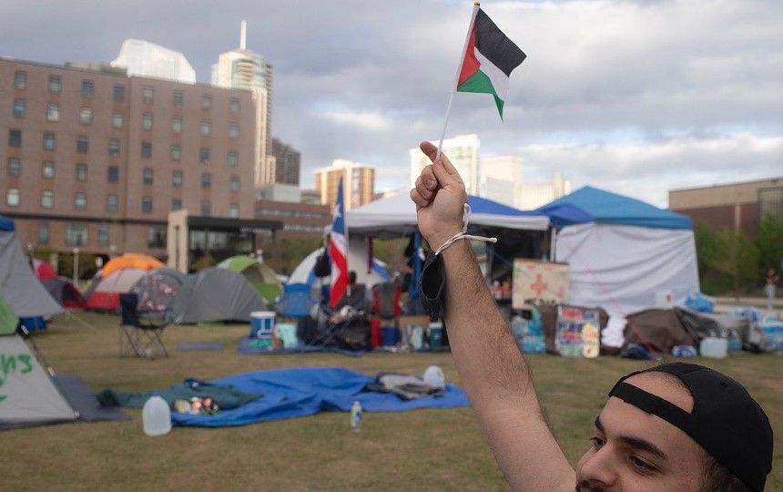 Palestine flag waved during college campus protest