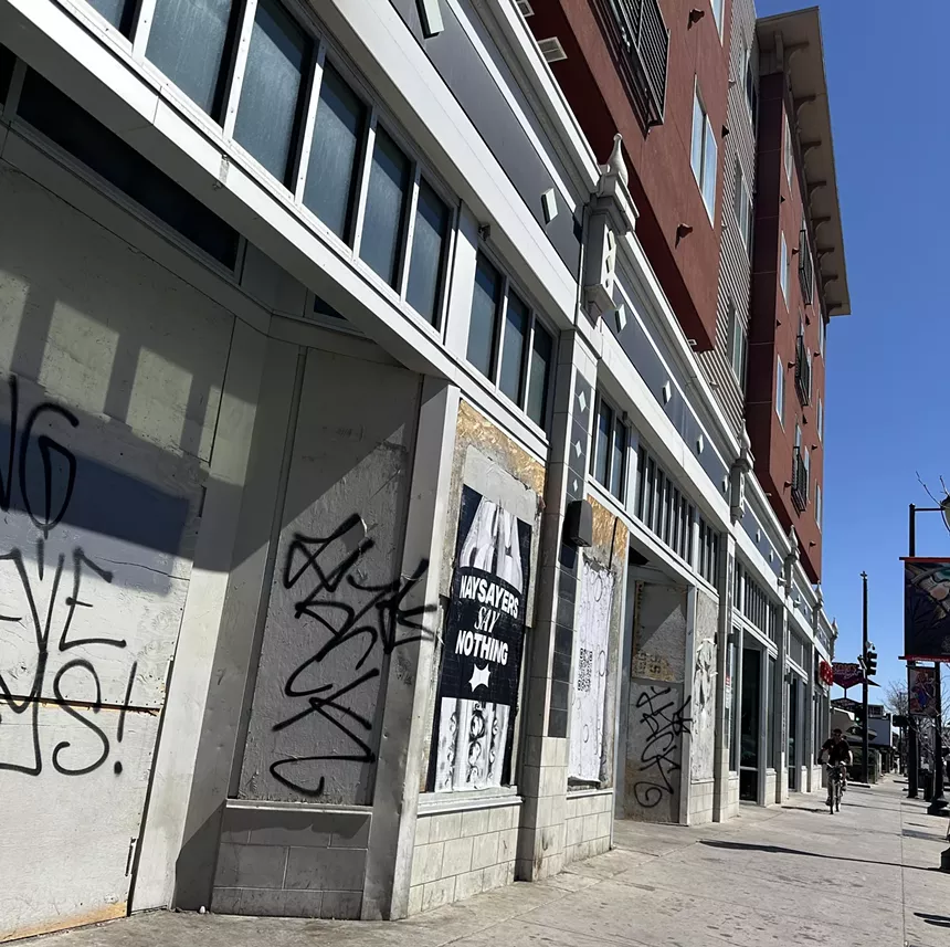 An empty and boarded up business in Denver, Colorado.