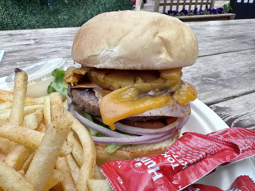 a burger with pineapple