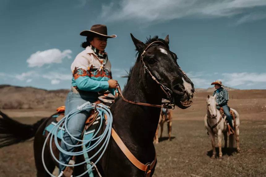 Emma Brown riding on horseback at Brown Family Ranch