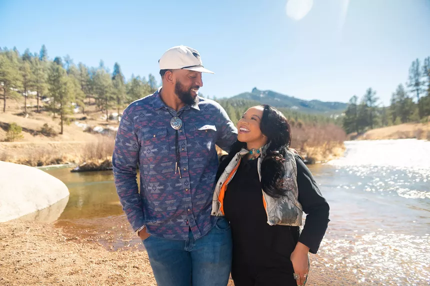 Angel and Bobby Massie posed along a river in Colorado