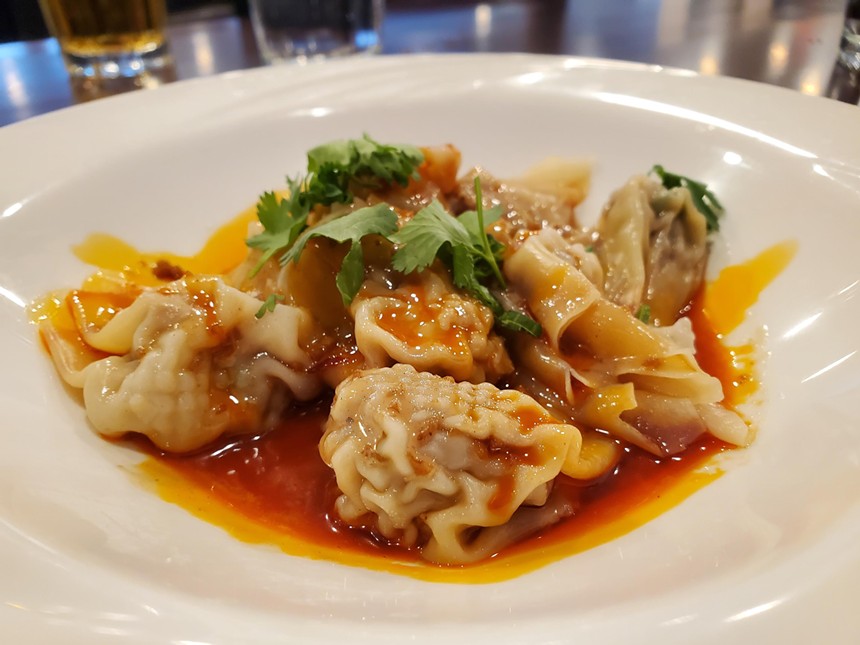 small dumplings in a red chile sauce