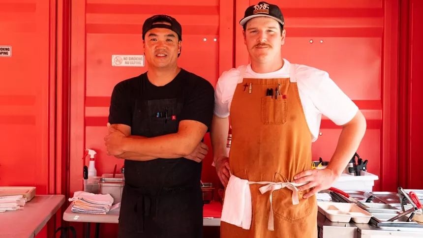 two men in aprons